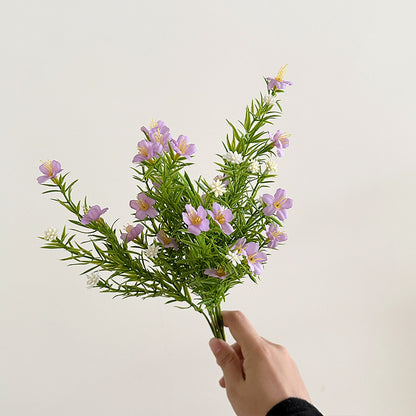 Realistische Blumenanordnung