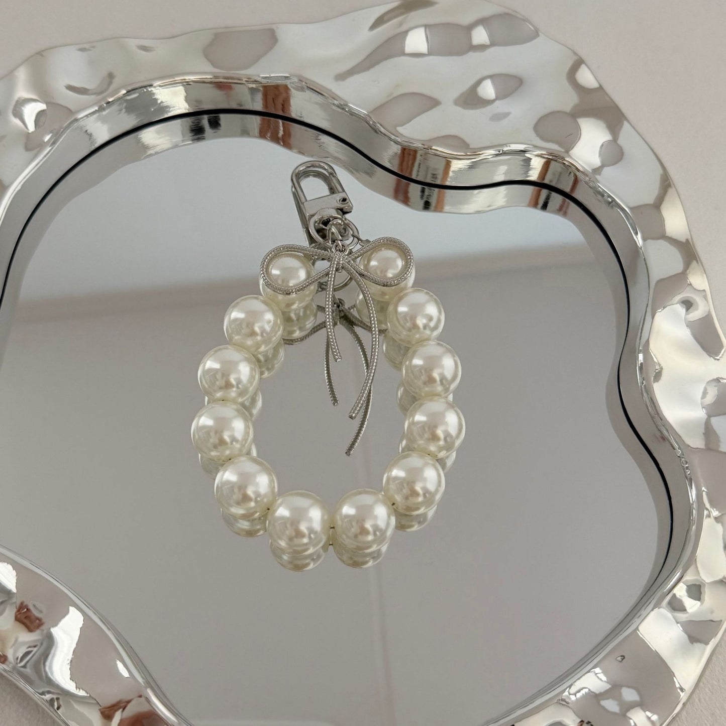 Eleganter Perlencharms-Schlüsselanhänger Brehn