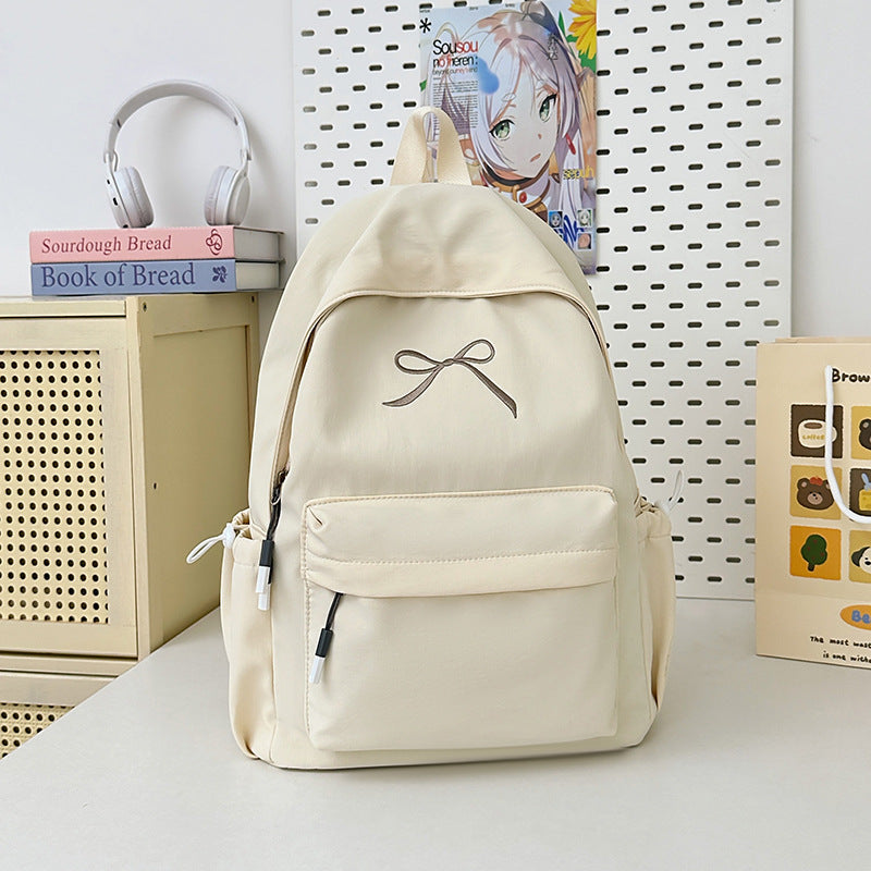 Minimalistischer Schultasche mit Schleifenverzierung
