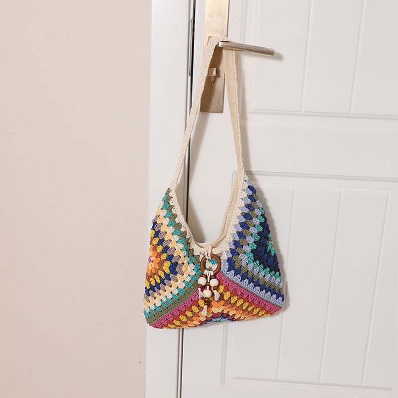 Damen Handtasche mit kunstvollem Flechtmuster Brehn