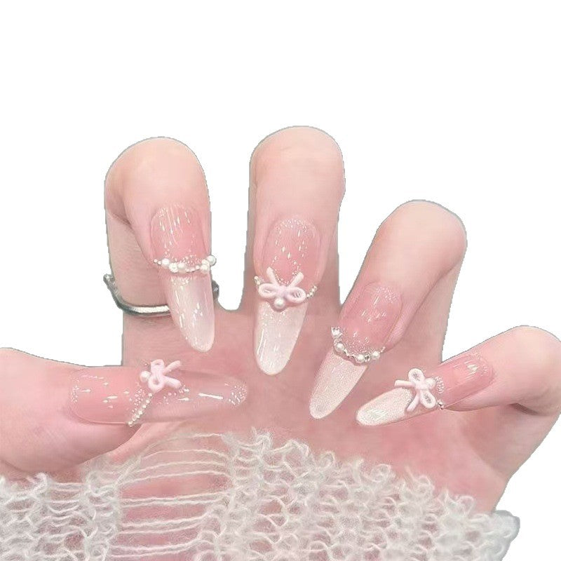 Elegante Stiletto Nagel Kunst Tipps mit Perlenakzenten