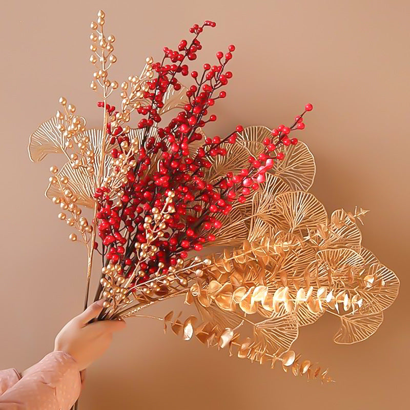 Dekoratives Goldenes Münz-Zweig Arrangement