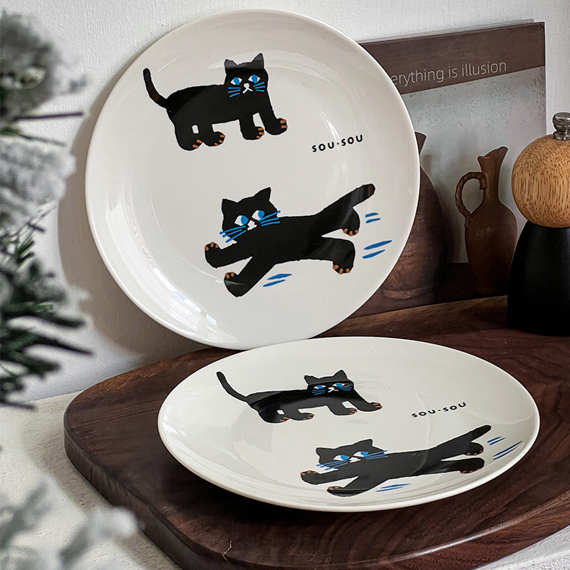 Keramikteller mit verspieltem Katzenmotiv und matt-glänzender Glasur
