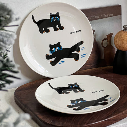 Keramikteller mit verspieltem Katzenmotiv und matt-glänzender Glasur