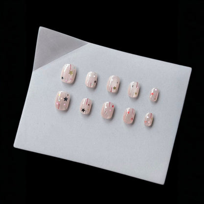 Künstlerisches Press-On Nagelkunstset mit Stern- und Glitzermotiven