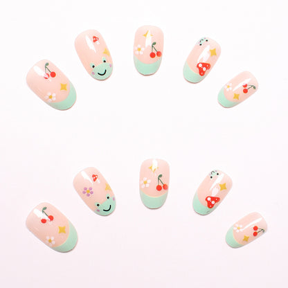 Kunstnagelset mit fröhlichen 3D-Motiven und blühenden Akzenten Brehn