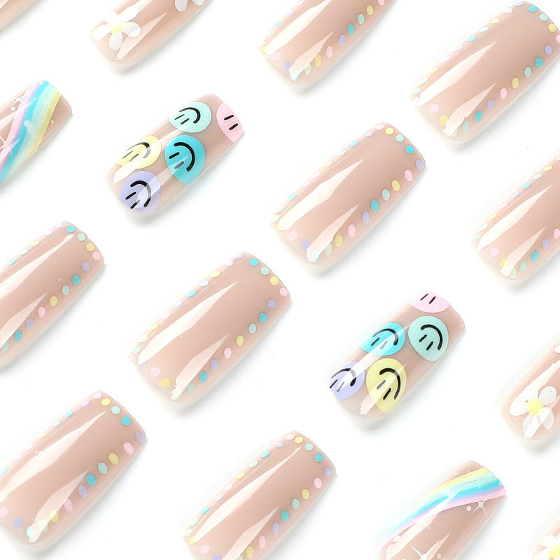 Kunstvolle Nagelkunst mit Blumen- und Smiley-Motiven Brehn