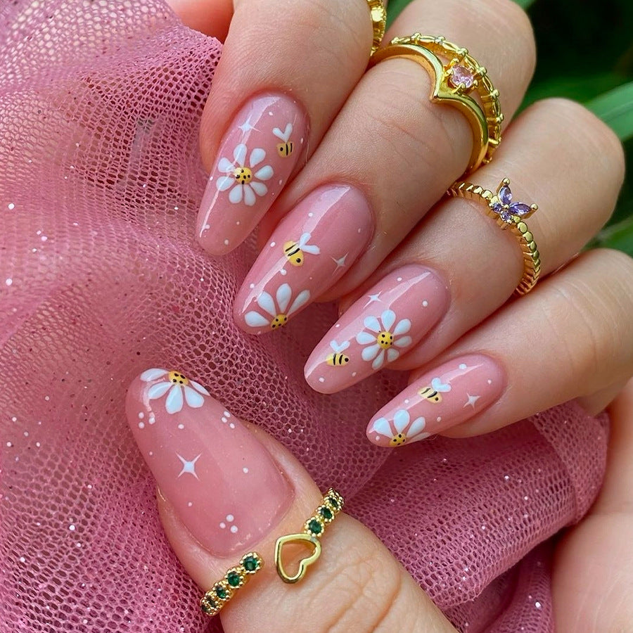 Kunstnägel Set mit eleganten Blüten und Glitzerakzenten Brehn