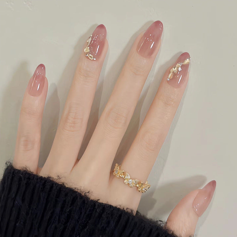 Premium Stiletto Press-On Nail Art mit goldenen Akzenten Brehn