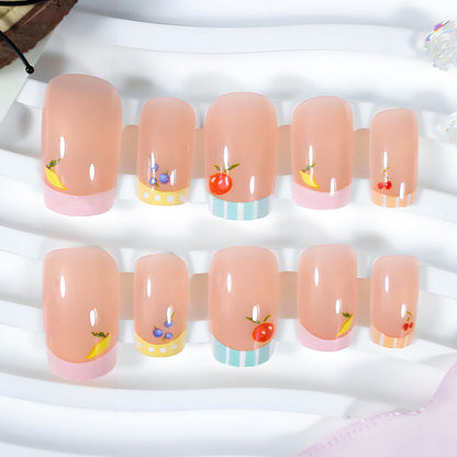 Kunstnagelset mit fröhlichen Obst-Designs und bunten Akzenten Brehn