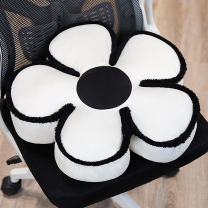 Gepolstertes Sitzkissen in Blumenform mit Kunstleder‑Mittelstück und flauschiger Randpolsterung