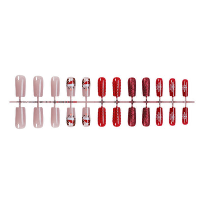 Kunstnagelset mit festlichen Weihnachtsmotiven und Glitzerakzenten Brehn