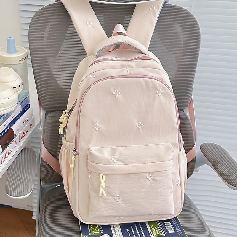 Blumenverzierte leichte Schulrucksack