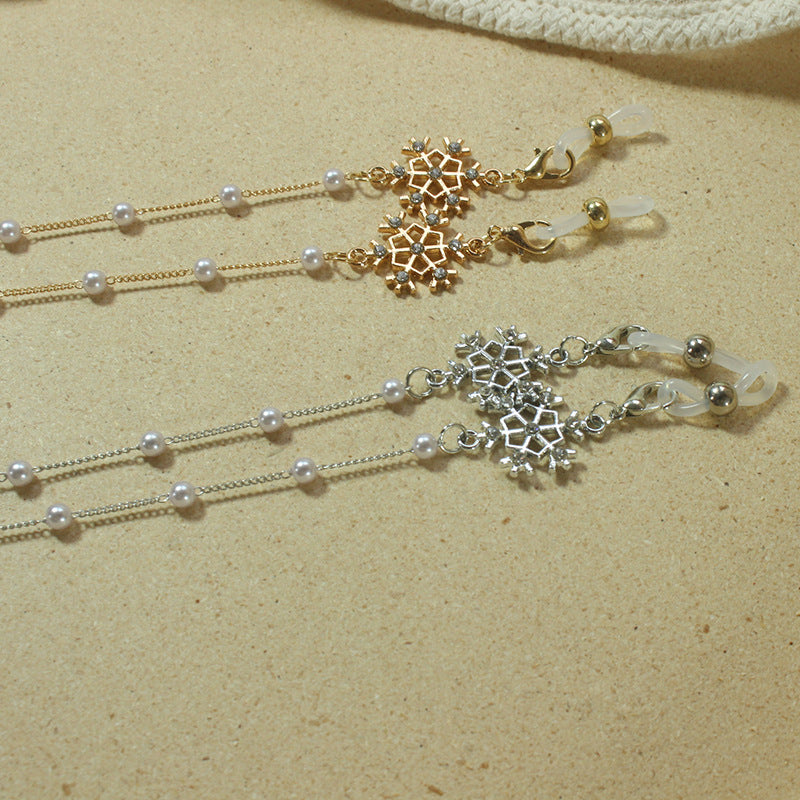 Elegante Brillenhalterkette mit Perlen und Schneeflockenanhänger Brehn