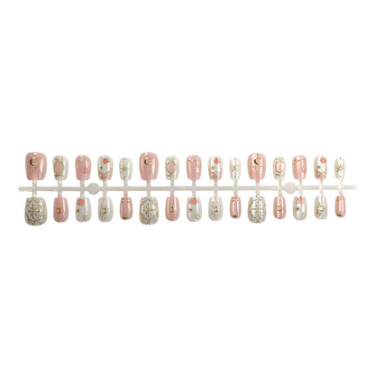 Dekoratives Press-On Nagelkunst-Set mit himmlischem und geometrischem Design