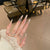 Wiederverwendbares Stiletto Nagelkunst Set mit eleganten Strassverzierungen Brehn