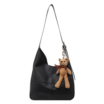 Lederhandtasche mit Teddy-Anhänger