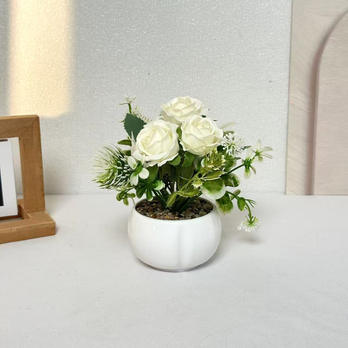 Dekorative Miniatur Blumenarrangement