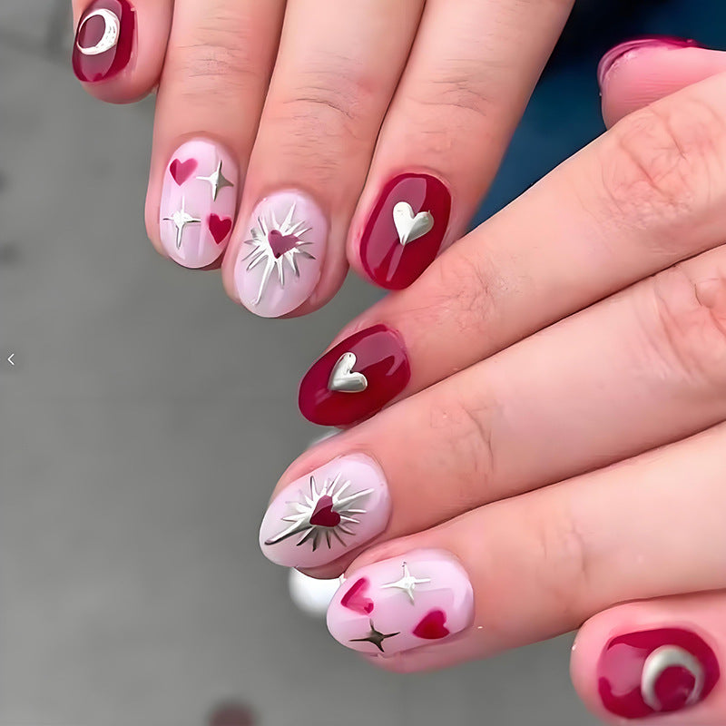 Kunstnagelset mit romantischen Herz- und Sternenmotiven Brehn
