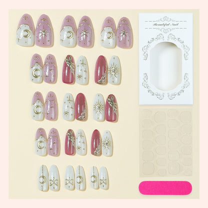 Kunstnagelset mit glamourösen Glitter- und Sternakzenten Brehn
