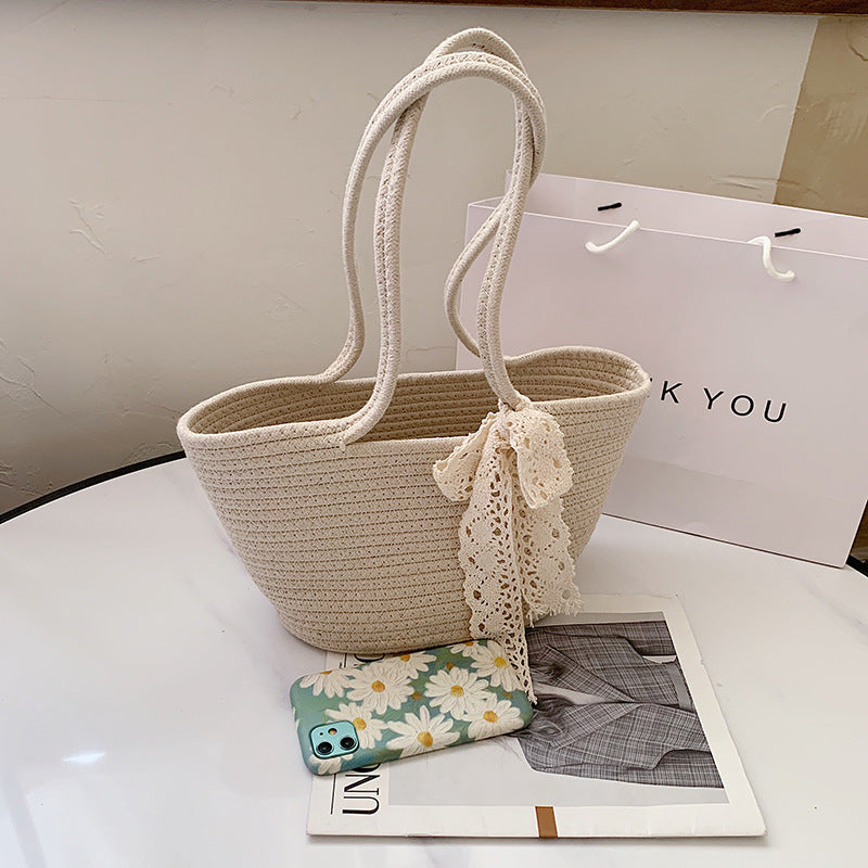 Elegante Bast-Handtasche mit Spitzenakzent Brehn