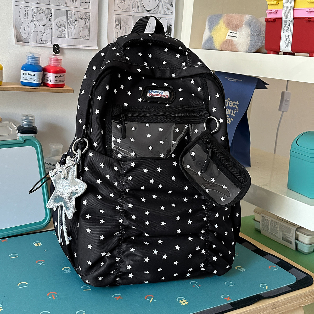 Stylische Mehrfach-Taschen-Rucksack mit Sternakzenten Brehn