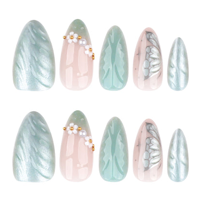 Kunstvolle Stiletto-Nägel mit floralem und dekorativem Design Brehn