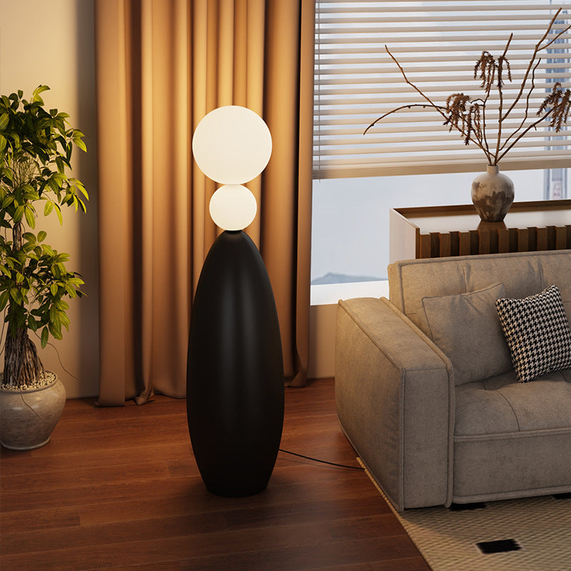 Skulpturale Stehlampe mit dualem Globusdesign