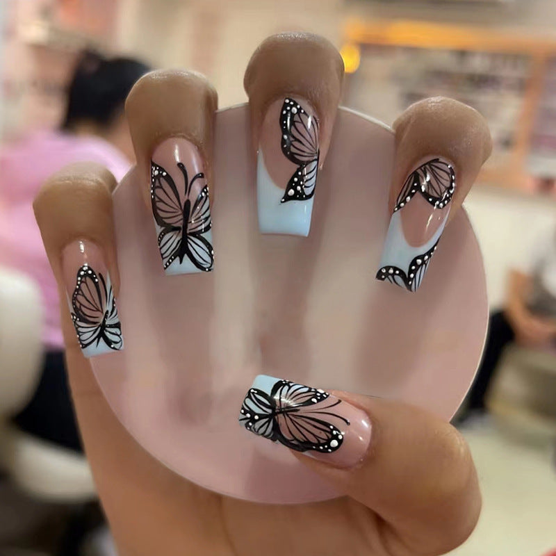 Künstlerisches Schmetterlingsdesign Press-On Nagelspitzen Brehn