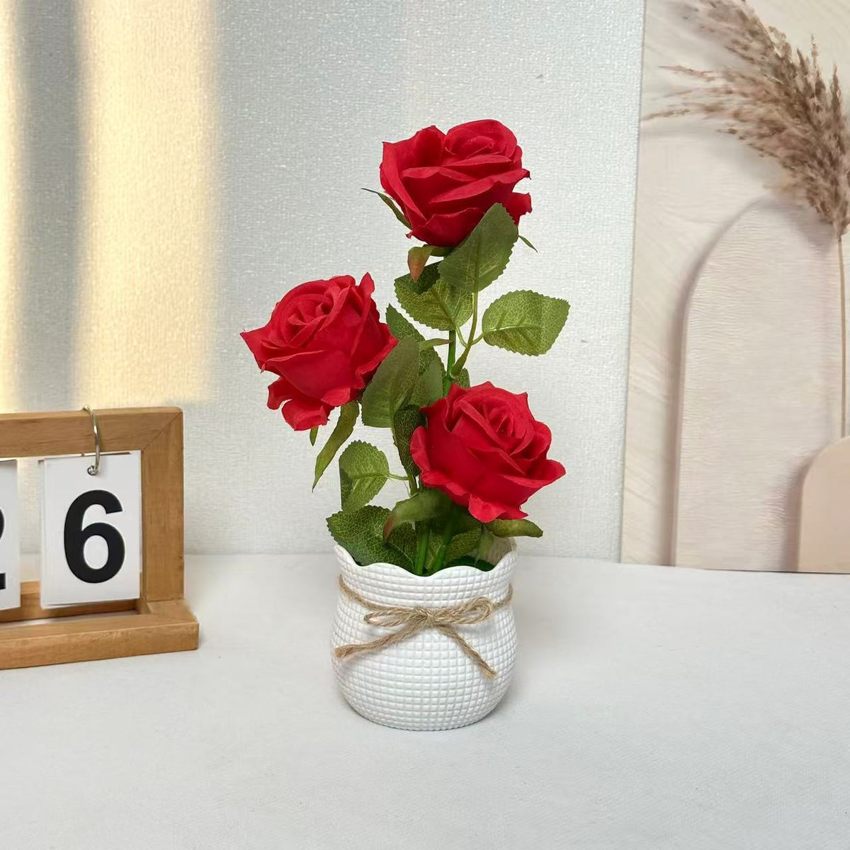 Elegante künstliche Rosenanordnung für die Wohnkultur