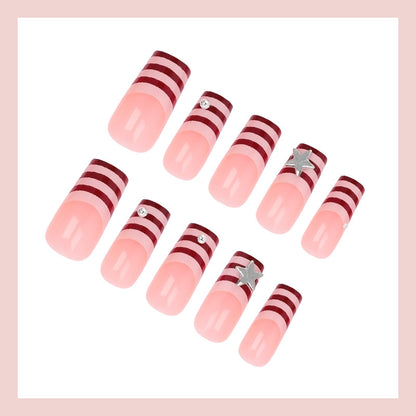 Kunstnagelset mit modernem Streifen-Design und funkelnden Sternen Brehn
