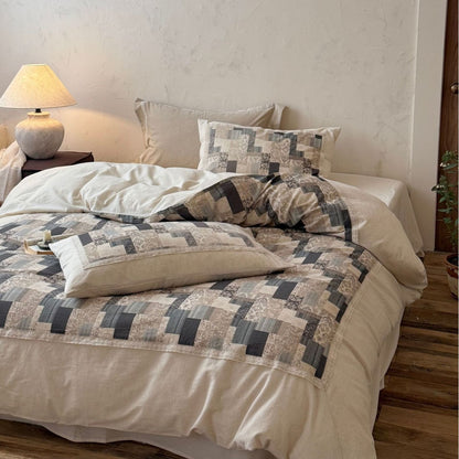 Moderne Patchwork-Bettwäschegarnitur in Leinenoptik mit Wende-Design