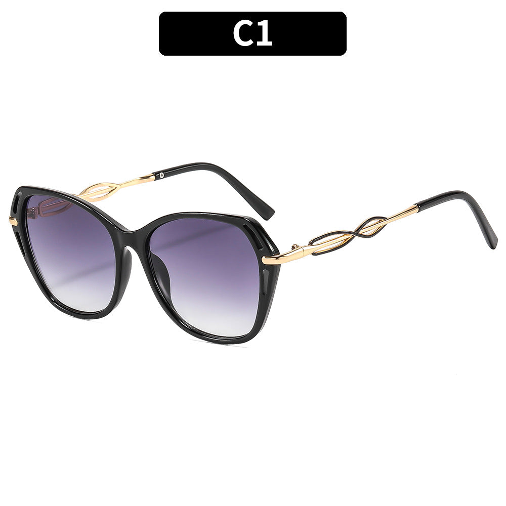 Stylische Cat-Eye-Sonnenbrillen mit eleganten goldenen Akzenten