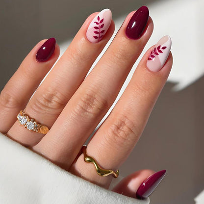 Kunstnagelset mit eleganten Blattmotiv-Designs Brehn