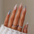Kreatives Kunstnagelset mit eleganten Mustern Brehn