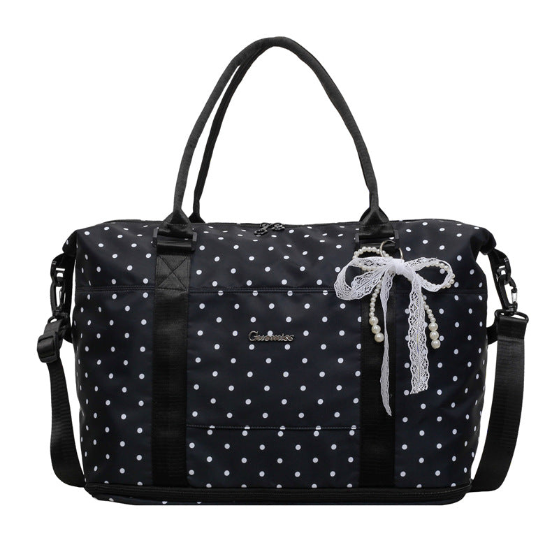Stylische gepunktete Reisetasche