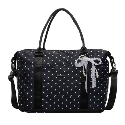 Stylische gepunktete Reisetasche