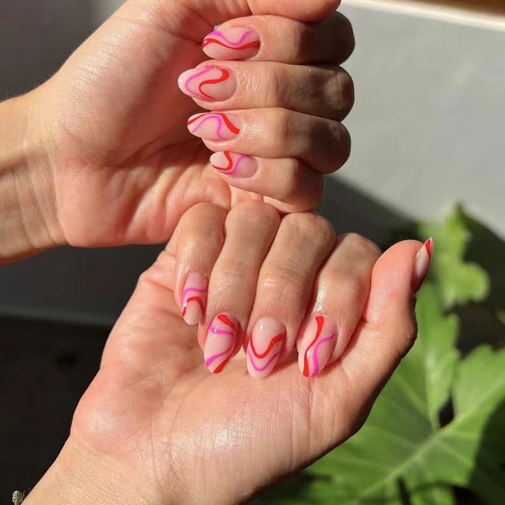 Künstlerisches Press-On-Nagelset mit kreativem Wirbel-Design Brehn