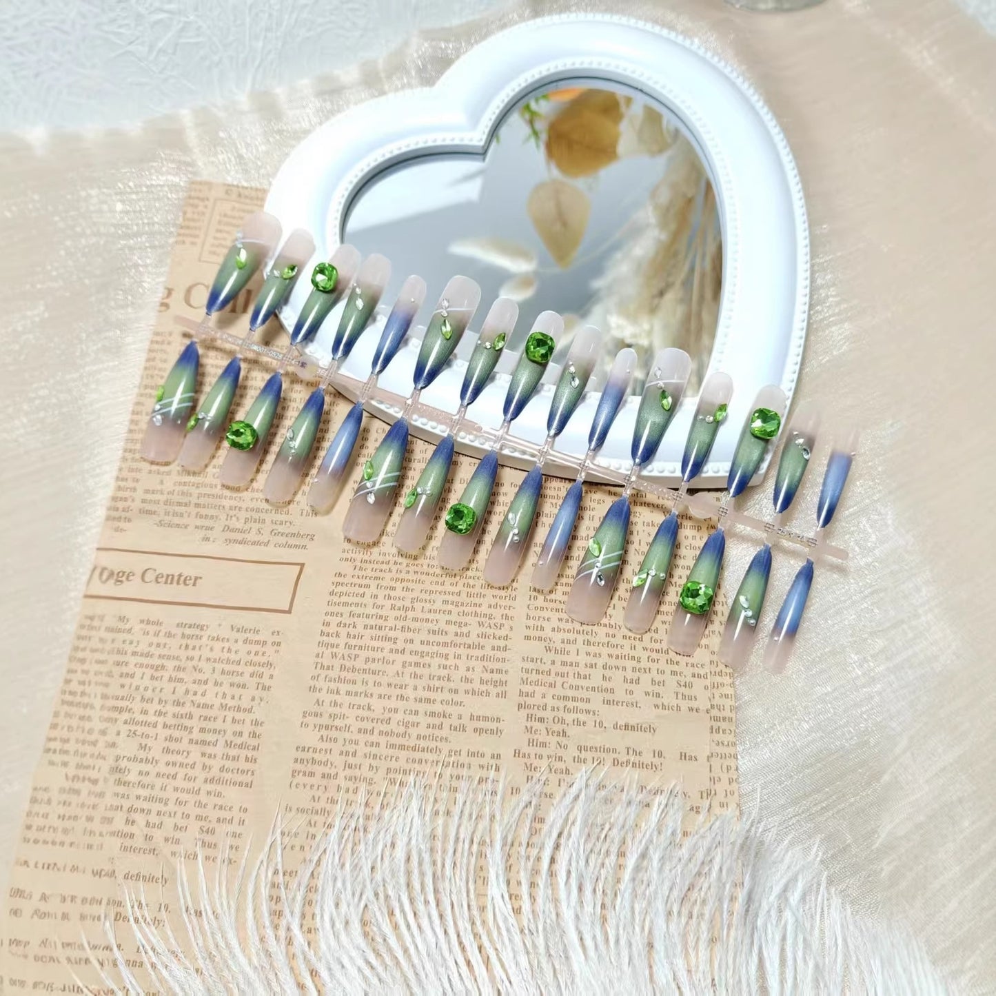 Kunstnägel mit elegantem Farbverlauf und Glitzerakzenten Brehn