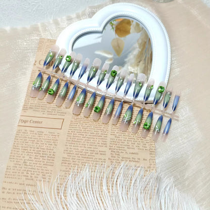 Kunstnägel mit elegantem Farbverlauf und Glitzerakzenten Brehn