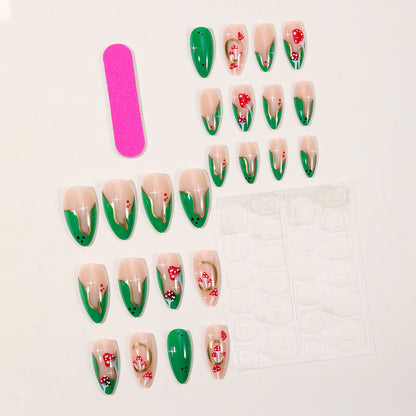 Künstlerische Stiletto-Nagelverlängerungen mit floralen Akzenten Brehn