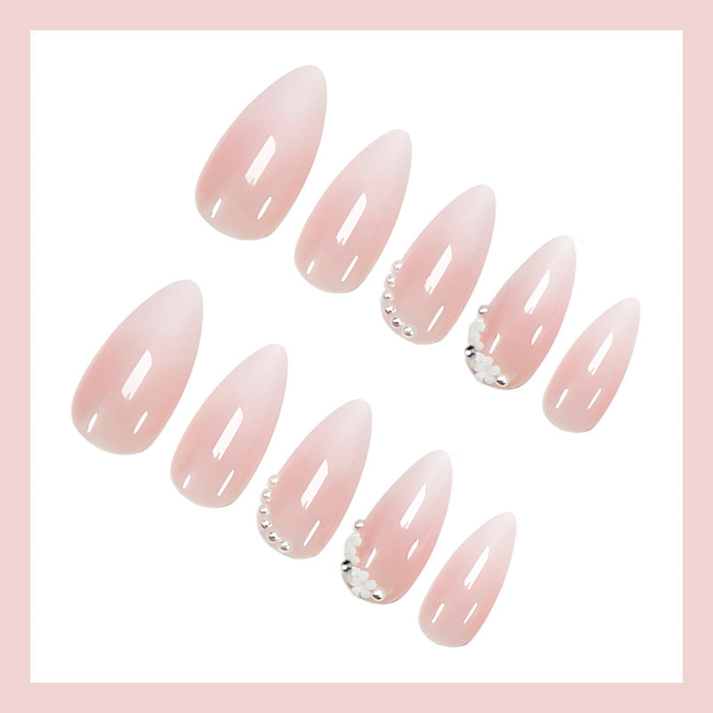 Kunstnagelset mit eleganten Ombre-Effekten und Glitzerakzenten Brehn