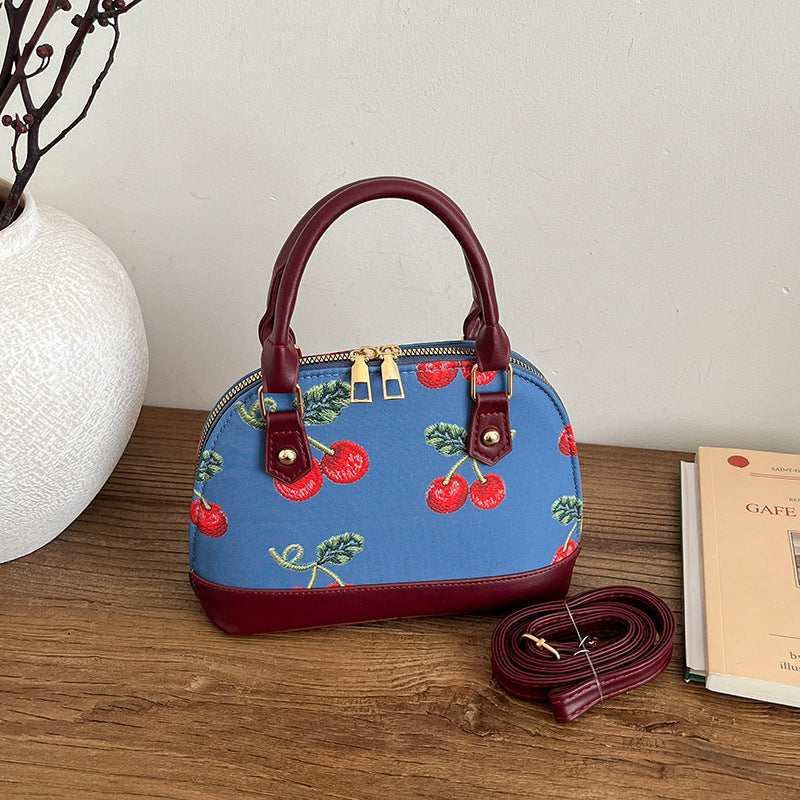 WoBestickte Kirschmuster-Handtasche Brehn