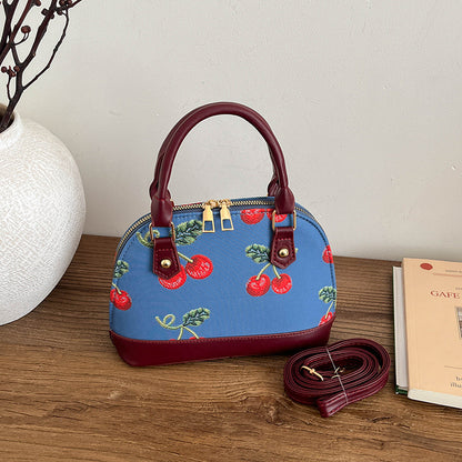 WoBestickte Kirschmuster-Handtasche Brehn