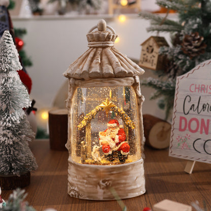 Beleuchtete Weihnachtslaterne mit Schneeszenen Brehn