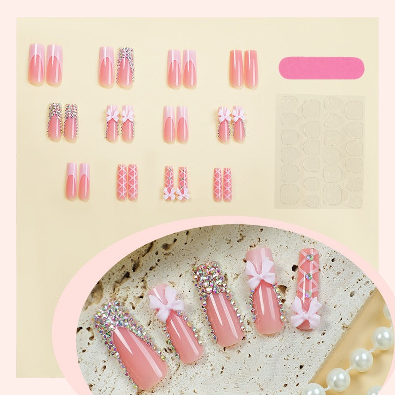 Kunstnagelset mit Glitzer- und Schleifenmotiv Brehn
