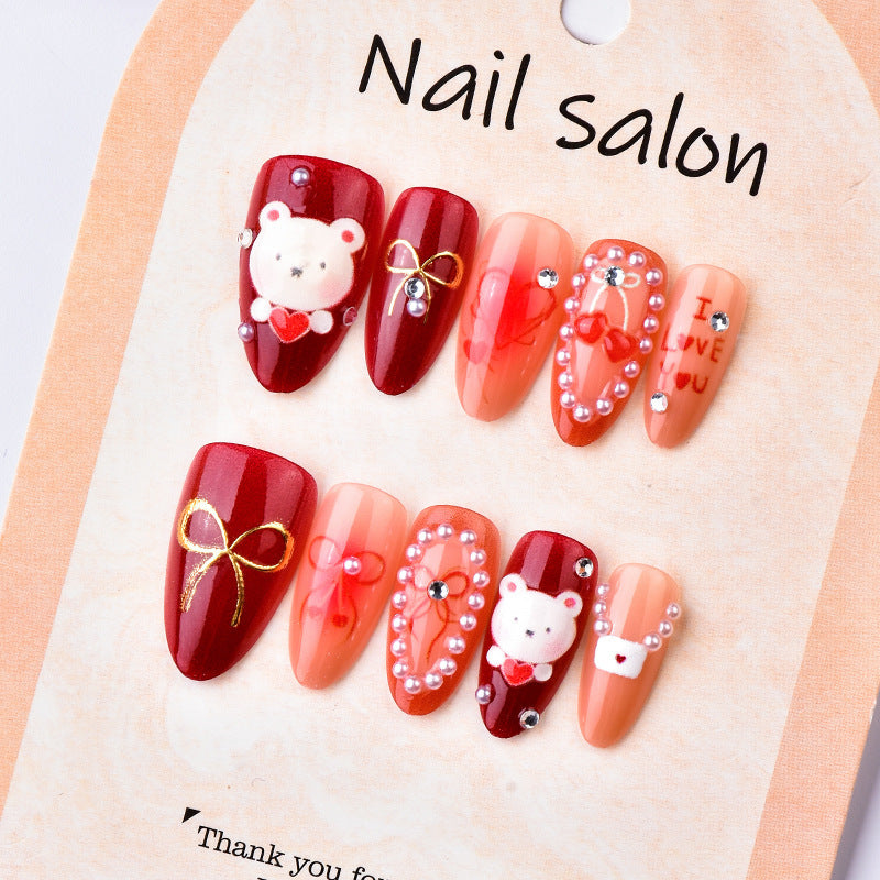 Kunstvolle Nagelset mit liebevollen Motiven Brehn