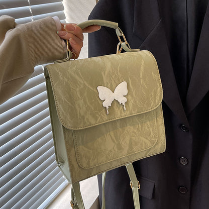 Schmetterlingsverzierte Handtasche