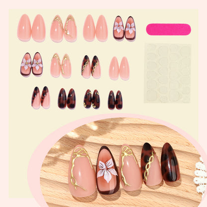 Künstlerisches Press-On-Nagelset mit eleganten Blumen- und abstrakten Designs Brehn