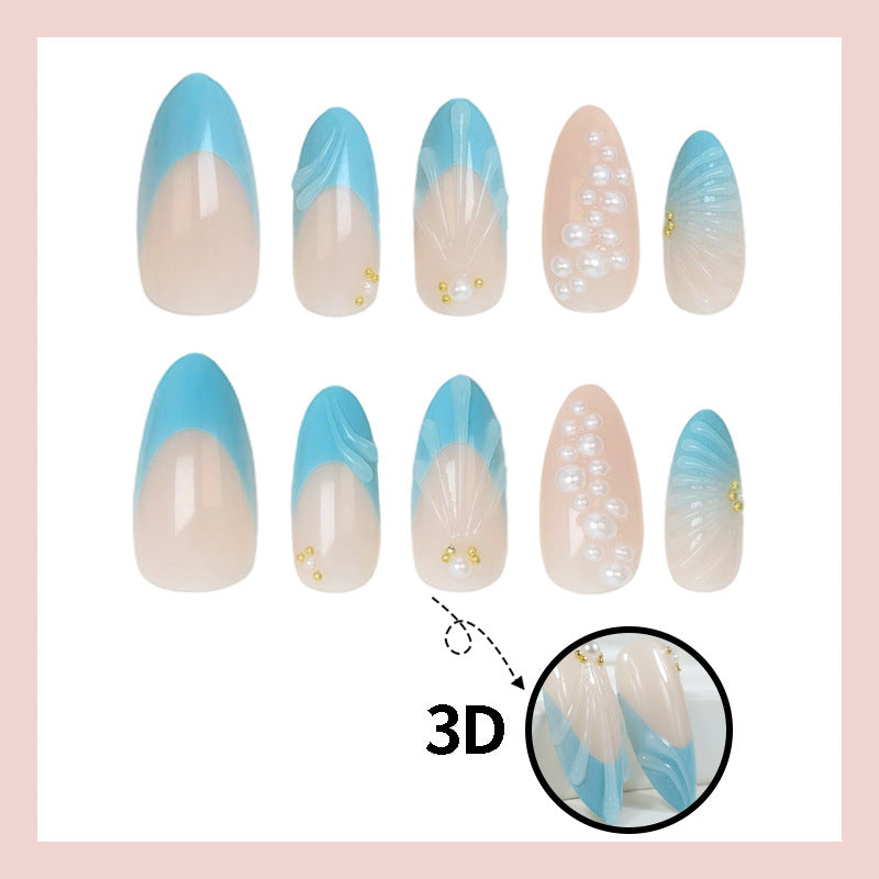 Kunstnagelset mit eleganten Muschel- und Perlenverzierungen Brehn